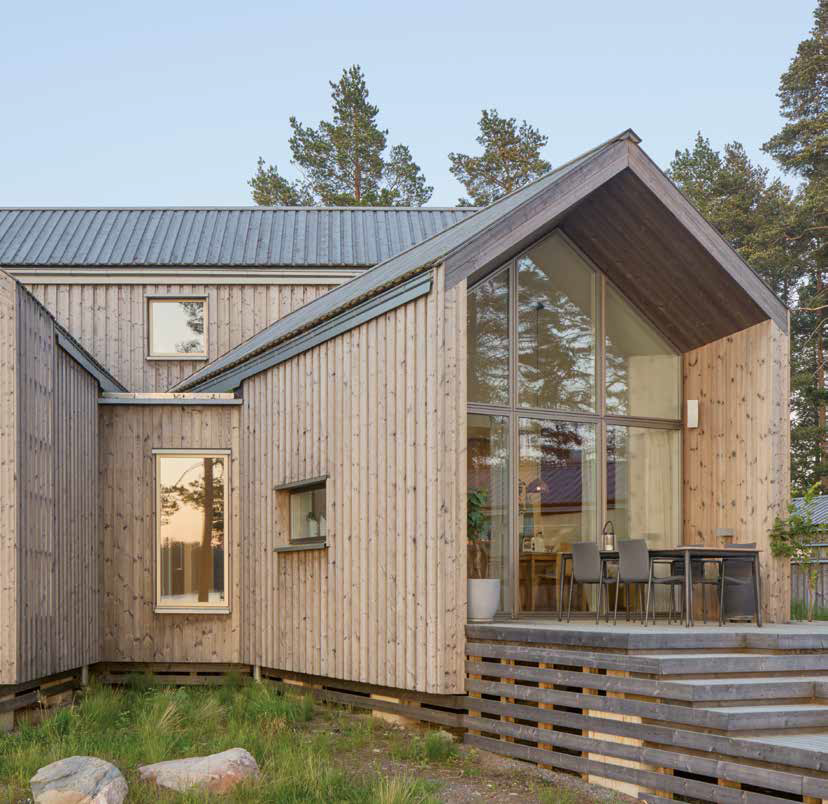 edificio in legno nel verde | casa in legno